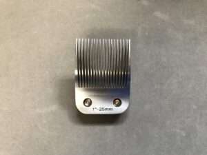 Aluminum heat sink with fins on gray background.