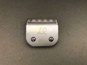 Clipper blade attachment number 10 on table.
