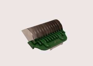 Stainless steel herb cutter with green handle.
