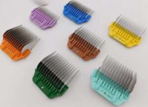 Assorted colorful hair clipper guards displayed on white.