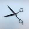 Professional hair scissors on white background