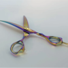 Colorful hairdressing scissors on white background.