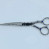 Decorative hairdressing scissors with blue stones.
