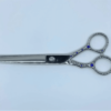 Professional hairdressing scissors with blue gemstones.