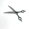 Professional hairdressing scissors on white background.