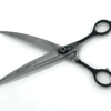 Professional black hairdressing scissors on white background.