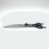 Professional black hairdressing scissors on white background