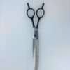 Hair thinning scissors on white background.