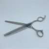Silver hair thinning scissors on white background.