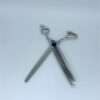 Professional hair thinning scissors on white background.