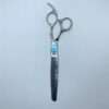 Professional hair thinning scissors on white background.