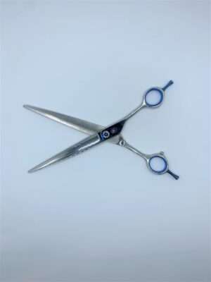 Professional barber shears with blue accents.