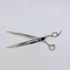 Silver hairdressing scissors on white background.