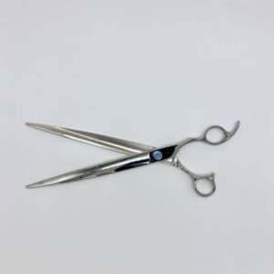 Silver hairdressing scissors on white background