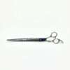Silver barber scissors on white background