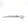 Curved grooming scissors on white background.