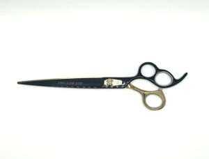 Professional hair scissors on white background.