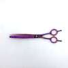 Purple hair thinning scissors on white background.