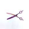 Colorful hair thinning scissors against white background