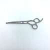 Professional hair cutting scissors on white background.