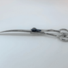 Professional hairdressing scissors on white background.