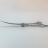 Stainless steel surgical scissors on white background.