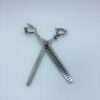 Hair thinning scissors with decorative handles.