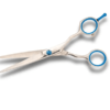 Professional hairdressing scissors on white background