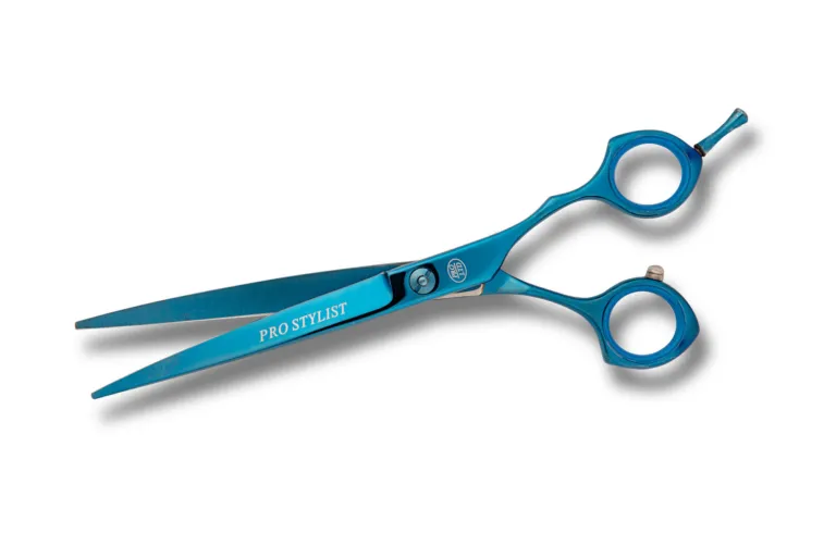 Blue professional hairstyling scissors isolated on white.