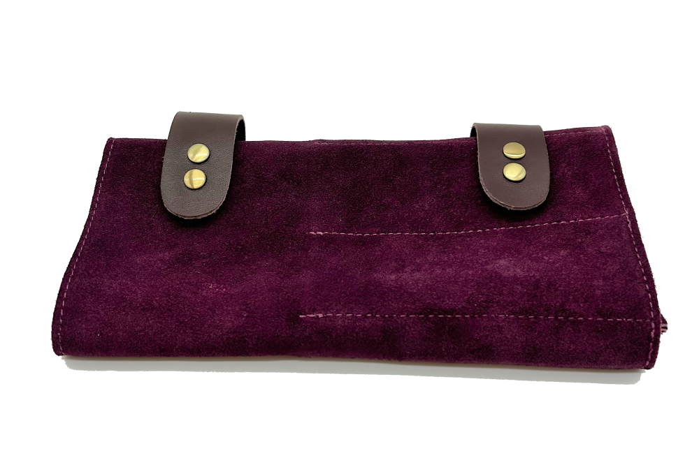 Purple suede clutch with brown leather straps.