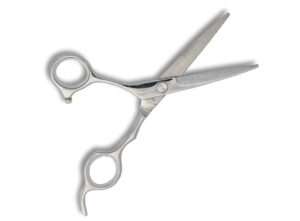 Professional silver hairdressing scissors on white background.