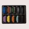 Hair clipper guards set in various sizes and colors.