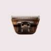Electric hair clipper head on white background.