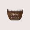Metal pet grooming clipper blade.