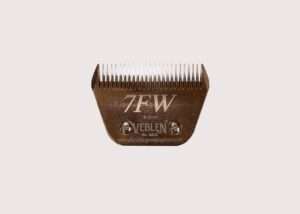 Metal pet grooming clipper blade.