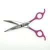 Stainless steel hairdressing scissors with pink accents.