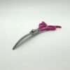 Purple-handled stainless steel scissors on white background.