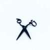 Black hair scissors on white background