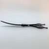 Curved black hairdressing scissors on white background