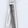 Close-up of professional thinning scissors.
