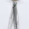 Silver hair thinning scissors on white background