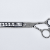 Professional hair thinning scissors on white background.