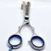 Professional hair thinning scissors on white background.