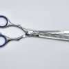 Silver hair thinning shears with blue handles