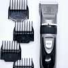 Hair clipper with four guard attachments