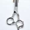 Silver texturizing scissors on white background