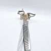 Stainless steel thinning shears on wooden block