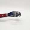 Close-up of a red-handled glass cutter tool.