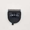 Close-up of hair clipper blade on white background.