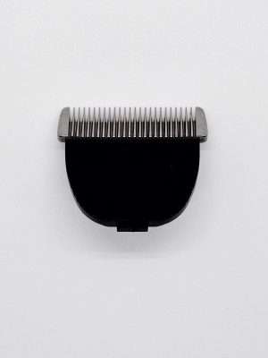 Black hair clipper blade on white background